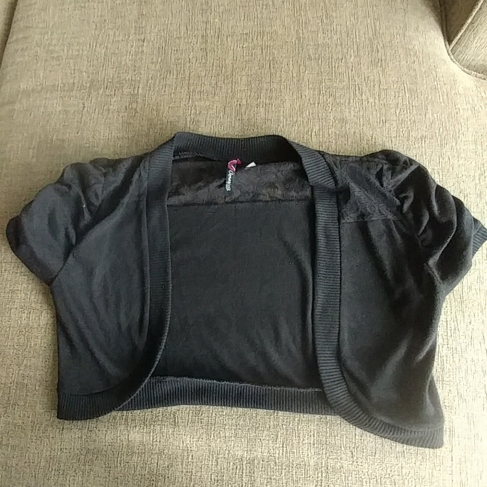 Short black outerwear